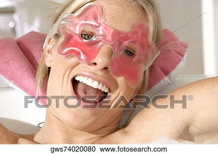 Portrait of a young woman laughing in a bathtub View Large Photo Image Stock Image - Portrait of a young woman laughing in a bathtub. Fotosearch