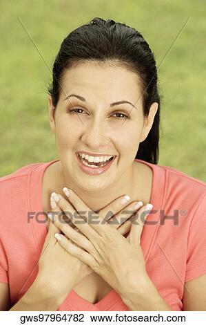 Portrait of a young woman laughing View Large Photo Image Stock Image - Portrait of a young woman laughing. Fotosearch