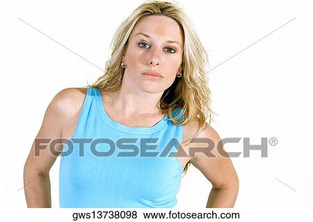 Portrait of a young woman looking serious View Large Photo Image Stock Photo - Portrait of a young woman looking serious. Fotosearch