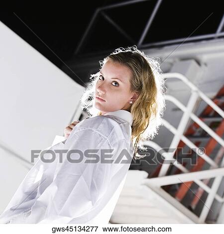 Portrait of a young woman looking serious View Large Photo Image Stock Photo - Portrait of a young woman looking serious. Fotosearch