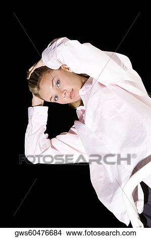 Portrait of a young woman posing View Large Photo Image Picture - Portrait of a young woman posing. Fotosearch