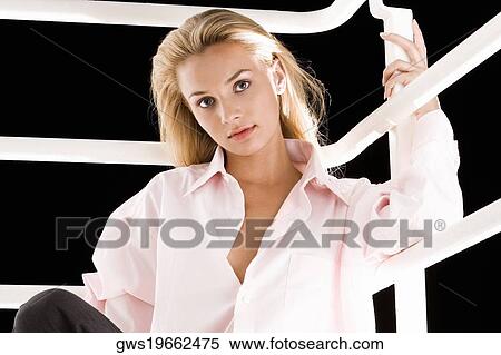 Portrait of a young woman posing View Large Photo Image Stock Photography - Portrait of a young woman posing. Fotosearch