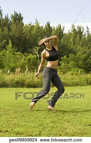 Portrait of a young woman practicing martial arts View Large Photo Image Picture - Portrait of a young woman practicing martial arts. Fotosearch