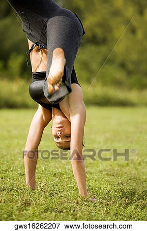 Stock Photo - Portrait of a young woman practicing martial arts. Fotosearch
