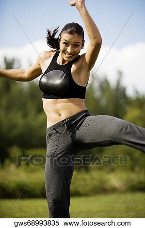 Stock Photography - Portrait of a young woman practicing martial arts. Fotosearch