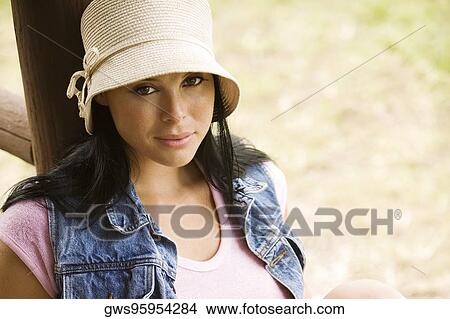 Portrait of a young woman smiling View Large Photo Image Picture - Portrait of a young woman smiling. Fotosearch