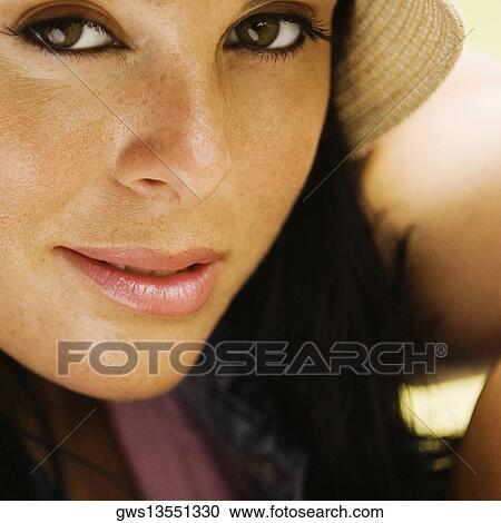 Portrait of a young woman smiling View Large Photo Image Stock Image - Portrait of a young woman smiling. Fotosearch