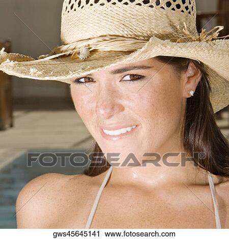 Portrait of a young woman smiling View Large Photo Image Stock Image - Portrait of a young woman smiling. Fotosearch