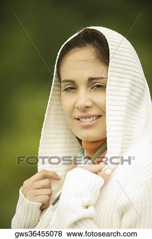 Portrait of a young woman smiling View Large Photo Image Stock Photo - Portrait of a young woman smiling. Fotosearch