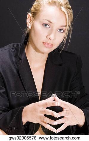 Stock Photo - Portrait of a young woman smiling. Fotosearch