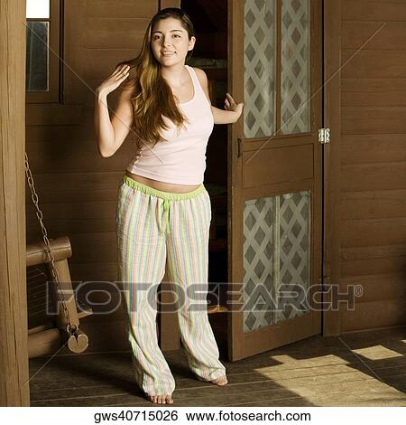 Portrait of a young woman smiling View Large Photo Image Stock Photograph - Portrait of a young woman smiling. Fotosearch