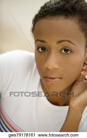 Portrait of a young woman View Large Photo Image Stock Image - Portrait of a young woman. Fotosearch