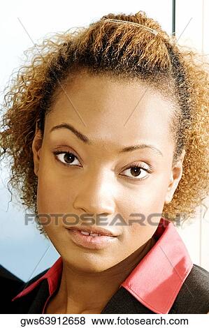 Portrait of a young woman View Large Photo Image Stock Photo - Portrait of a young woman. Fotosearch