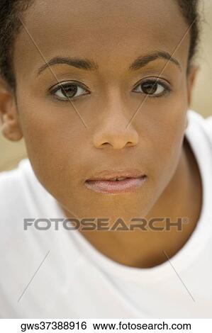 Portrait of a young woman View Large Photo Image Stock Photograph - Portrait of a young woman. Fotosearch