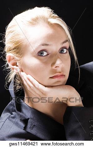 Portrait of a young woman thinking View Large Photo Image Stock Image - Portrait of a young woman thinking. Fotosearch