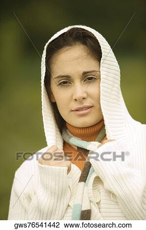 Stock Image - Portrait of a young woman thinking. Fotosearch