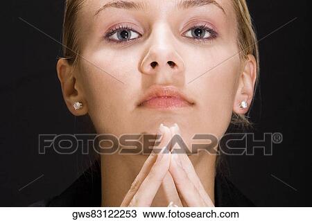 Portrait of a young woman thinking View Large Photo Image Stock Image - Portrait of a young woman thinking. Fotosearch
