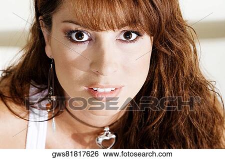 Portrait of a young woman thinking View Large Photo Image Stock Photograph - Portrait of a young woman thinking. Fotosearch
