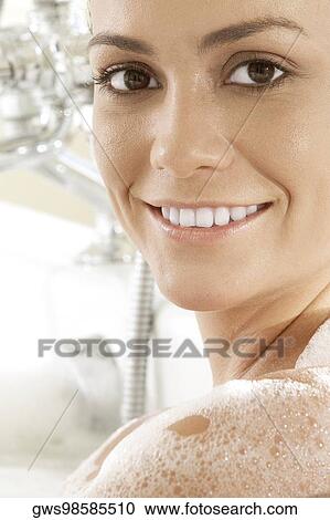 Portrait of a young woman with soap on her body View Large Photo Image Stock Image - Portrait of a young woman with soap on her body. Fotosearch