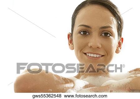 Portrait of a young woman with soap on her body View Large Photo Image Stock Photo - Portrait of a young woman with soap on her body. Fotosearch