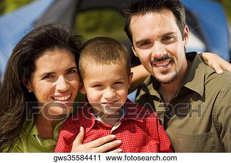 Portrait of parents and their son smiling View Large Photo Image Stock Image - Portrait of parents and their son smiling. Fotosearch