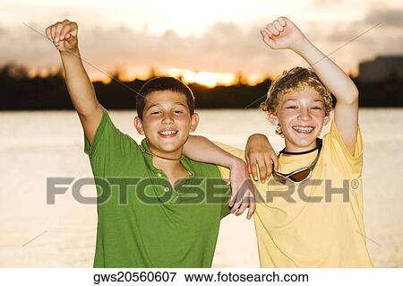 Portrait of two brothers smiling View Large Photo Image Stock Photo - Portrait of two brothers smiling. Fotosearch