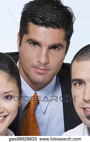 Stock Image - Portrait of two businessmen and a businesswoman. Fotosearch