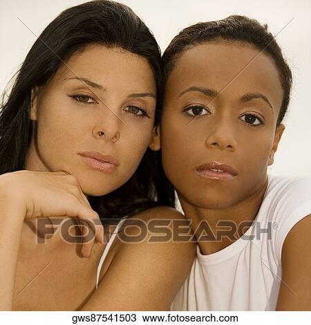 Portrait of two young women View Large Photo Image Stock Image - Portrait of two young women. Fotosearch