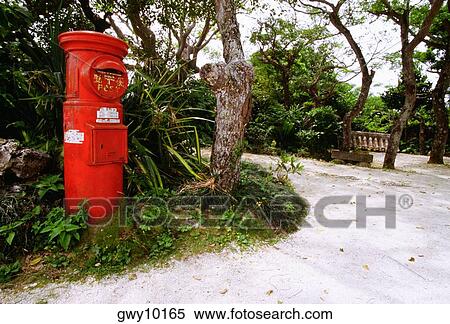 Red mailbox along a walkway, Taketomi, Ryukyus, Japan View Large Photo Image Stock Photography - Red mailbox along a walkway, Taketomi, Ryukyus, Japan. Fotosearch