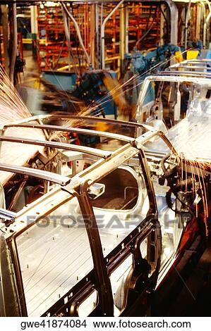 Robots welding a row of cars in an assembly line, Baltimore, Maryland, USA View Large Photo Image Picture - Robots welding a row of cars in an assembly line, Baltimore, Maryland, USA. Fotosearch