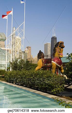 Stock Photo - Sculpture of a horse in an amusement park, Navy Pier Park, Chicago, Illinois, USA. Fotosearch