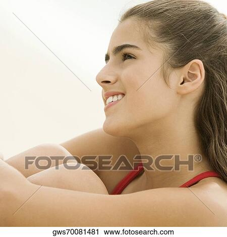 Side profile of a girl thinking View Large Photo Image Stock Image - Side profile of a girl thinking. Fotosearch