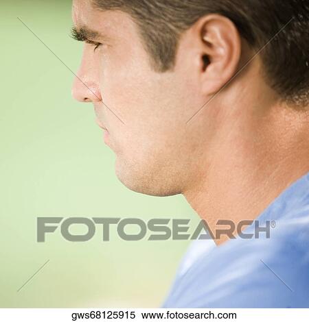 Side profile of a serious mid adult man View Large Photo Image Stock Photography - Side profile of a serious mid adult man. Fotosearch