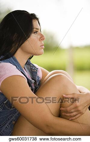 Stock Photo - Side profile of a young woman. Fotosearch