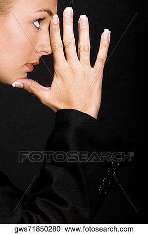 Side profile of a young woman thinking View Large Photo Image Stock Image - Side profile of a young woman thinking. Fotosearch