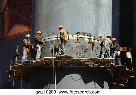 Steel workers working at a steel plant, Bethlehem Steel plant, Baltimore, Maryland, USA View Large Photo Image Stock Photo - Steel workers working at a steel plant, Bethlehem Steel plant, Baltimore, Maryland, USA. Fotosearch
