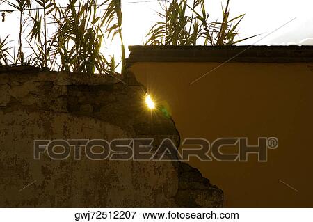 Sunlight passing through a damage wall, Mexico View Large Photo Image Stock Photo - Sunlight passing through a damage wall, Mexico. Fotosearch