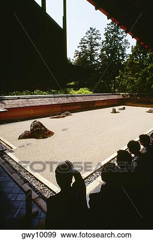Tourists in a rock garden, Ryoanji Zen Temple, Kyoto, Japan View Large Photo Image Stock Photo - Tourists in a rock garden, Ryoanji Zen Temple, Kyoto, Japan. Fotosearch