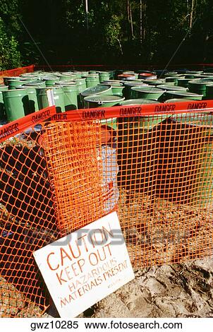 Warning sign in front of barrels of toxic waste, Virginia, USA View Large Photo Image Stock Photography - Warning sign in front of barrels of toxic waste, Virginia, USA. Fotosearch