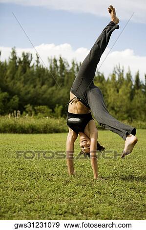 Young woman practicing martial arts View Large Photo Image Stock Photo - Young woman practicing martial arts. Fotosearch