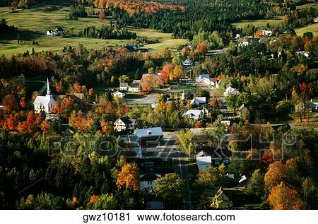 Stock Image - Aerial views of West burke, Vermont showing fall foliage. Fotosearch