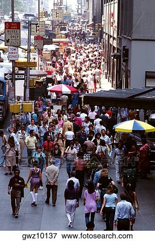 Alot of pedestrians on 42nd St., New York View Large Photo Image Stock Photo - Alot of pedestrians on 42nd St., New York. Fotosearch