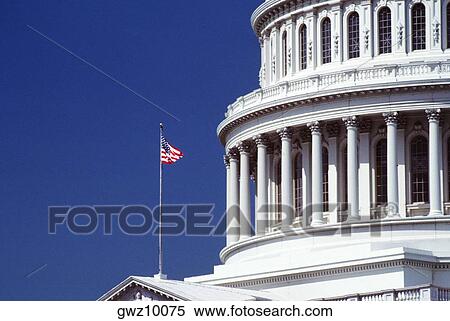American flag in front of a government building, Capitol Building, Washington DC, USA View Large Photo Image Stock Photography - American flag in front of a government building, Capitol Building, Washington DC, USA. Fotosearch