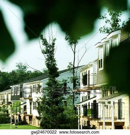 Stock Image - Buildings in a community. Fotosearch