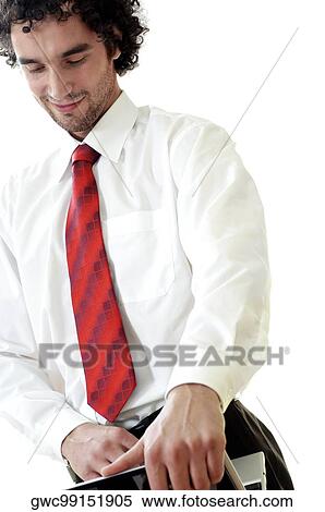 Businessman using a laptop View Large Photo Image Stock Photography - Businessman using a laptop. Fotosearch