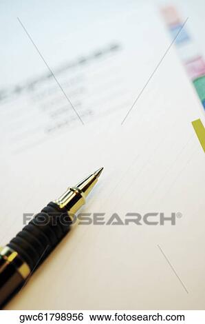 Close-up of a ballpoint pen on a personal organizer View Large Photo Image Stock Photograph - Close-up of a ballpoint pen on a personal organizer. Fotosearch