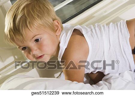 Close-up of a boy View Large Photo Image Stock Photo - Close-up of a boy. Fotosearch