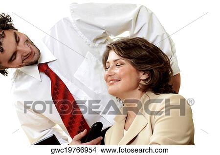 Close-up of a businessman and a businesswoman smiling View Large Photo Image Picture - Close-up of a businessman and a businesswoman smiling. Fotosearch