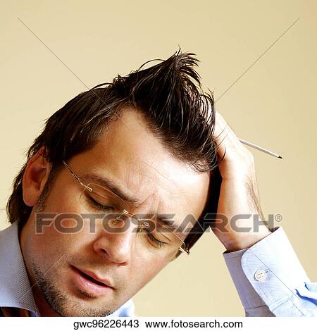 Close-up of a businessman holding a digitized pen View Large Photo Image Stock Image - Close-up of a businessman holding a digitized pen. Fotosearch
