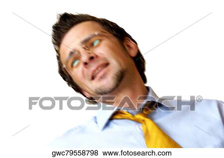 Close-up of a businessman looking away View Large Photo Image Stock Photo - Close-up of a businessman looking away. Fotosearch